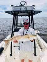 Greg with a whopper Redfish