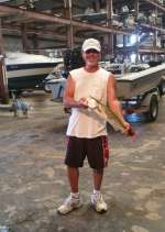Paulie M. At Cedar Key Marina With a 2.9 trout caught 7/16  "Way to go Paulie"