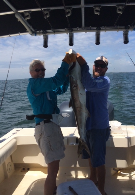 Loss charter with a monster 44 lbs cobia caught with Capt John of Hooked Up Charters