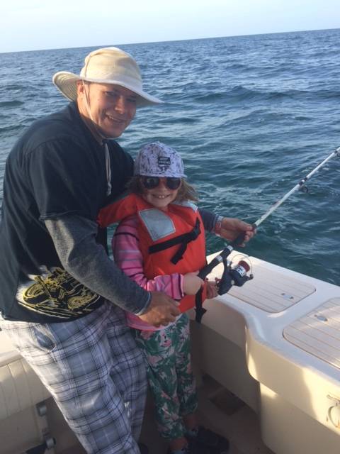 Father & Daughter Having Fun With Captain John