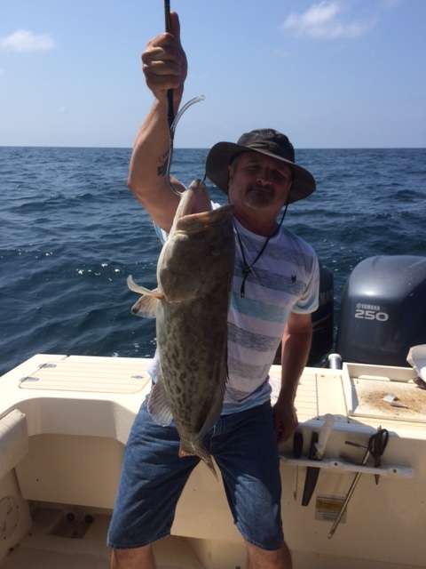 Mark with Ocala Auto Masters crew, caught this 30" Gag Grouper with Capt John