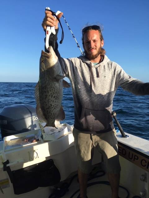 AJ with a nice grouper for dinner, caught with Captain John