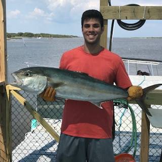 Austin with a beauty of an Amber Jack Captain John
