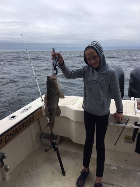 Ava with her 1st Gag Grouper, caught with Captain John