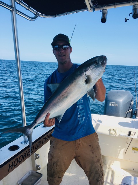 Kit with a beaut of an Amber Jack while soical distancing