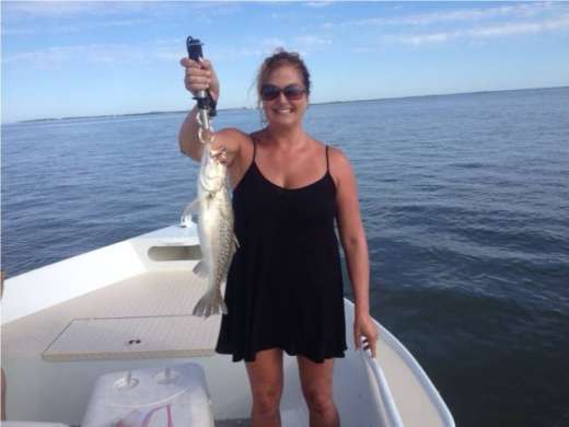 Ms. Hursh loves fishing with Capt Kyle of Hooked Up Charters
