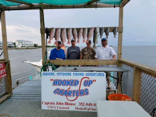 Burnsed crew with a nice catch on a  rough day with Captain John