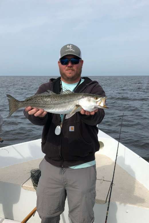 Captain Kyle showing off a nice trout