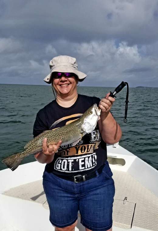 Duvall bbq crew sportin a gator trout caught with Captain Kyle