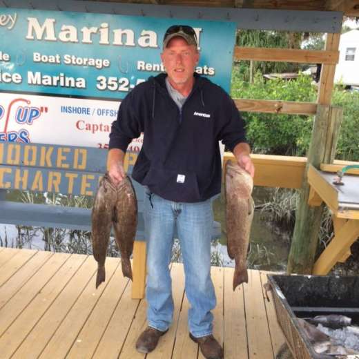 Vince just showing off his nice grouper to his crew