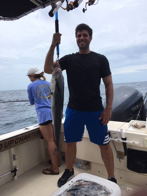 Scott and crew just having fun with an Amber Jack and Capt John