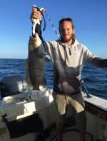 AJ with a nice grouper for dinner, caught with Captain John
