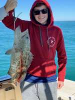John M with his 1st grouper with Capt John